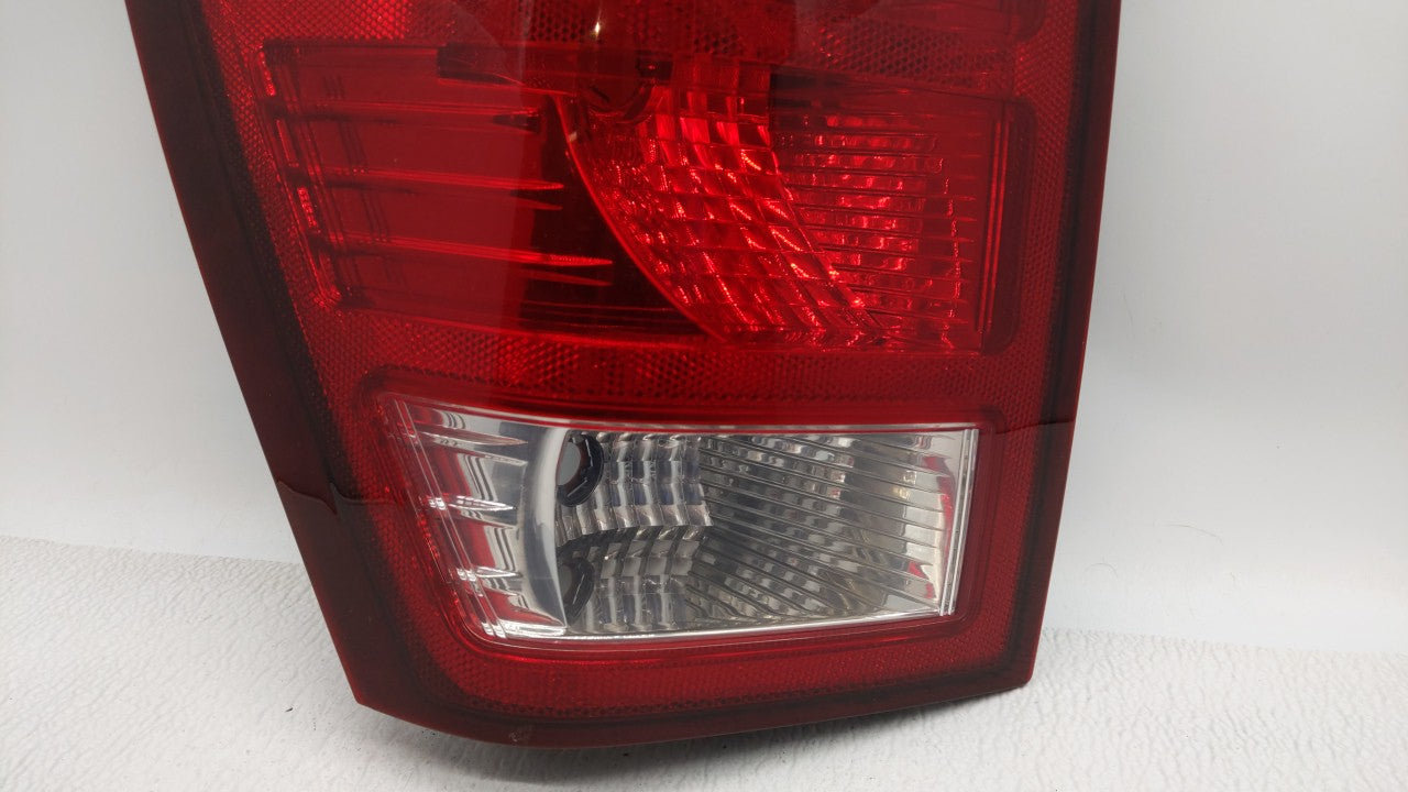 2007-2010 Jeep Grand Cherokee Tail Light Assembly Driver Left OEM P/N:55079013AC Fits 2007 2008 2009 2010 OEM Used Auto Parts - Oemusedautoparts1.com