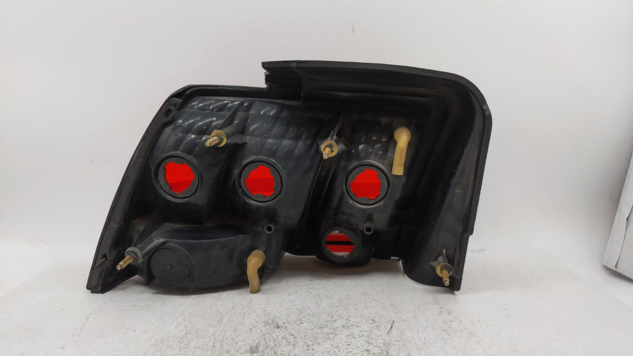 1999-2004 Ford Mustang Tail Light Assembly Passenger Right OEM P/N:XR33-13B504 331-1958R-UC Fits 1999 2000 2001 2002 2003 2004 OEM Used Auto Parts - Oemusedautoparts1.com