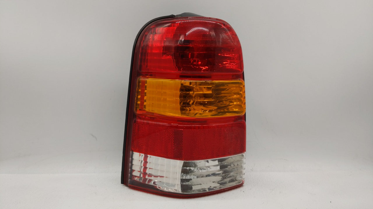 2001-2007 Ford Escape Tail Light Assembly Driver Left OEM P/N:4L84-13B505-D Fits 2001 2002 2003 2004 2005 2006 2007 OEM Used Auto Parts - Oemusedautoparts1.com