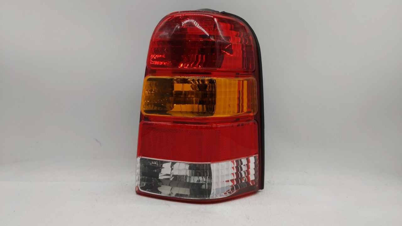 2001-2007 Ford Escape Tail Light Assembly Passenger Right OEM P/N:4L84-13B504-D Fits 2001 2002 2003 2004 2005 2006 2007 OEM Used Auto Parts - Oemusedautoparts1.com