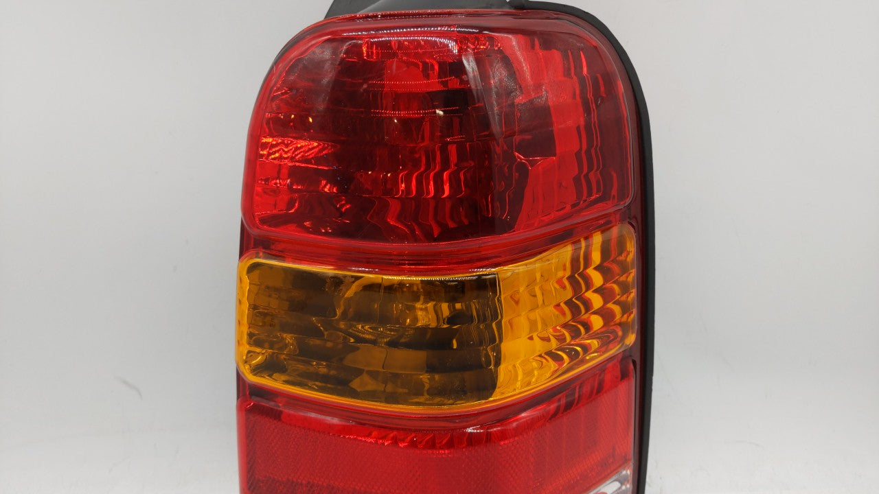 2001-2007 Ford Escape Tail Light Assembly Passenger Right OEM P/N:4L84-13B504-D Fits 2001 2002 2003 2004 2005 2006 2007 OEM Used Auto Parts - Oemusedautoparts1.com