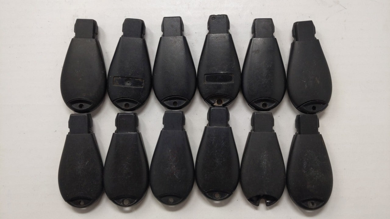 Lot of 12 Aftermarket Keyless Entry Remote Fob MIXED FCC IDS MIXED PART - Oemusedautoparts1.com