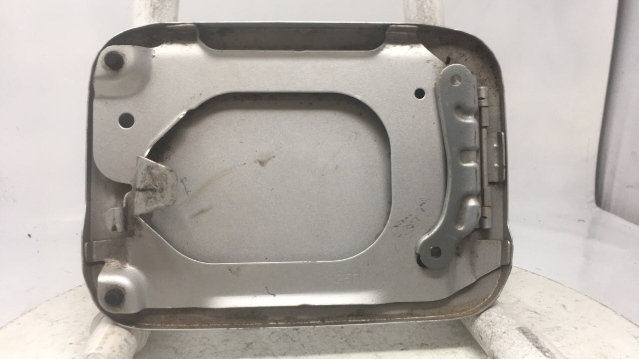 2000 Mazda Protege Dx Fuel Tank Door Lid Gas Tank Silver - Oemusedautoparts1.com