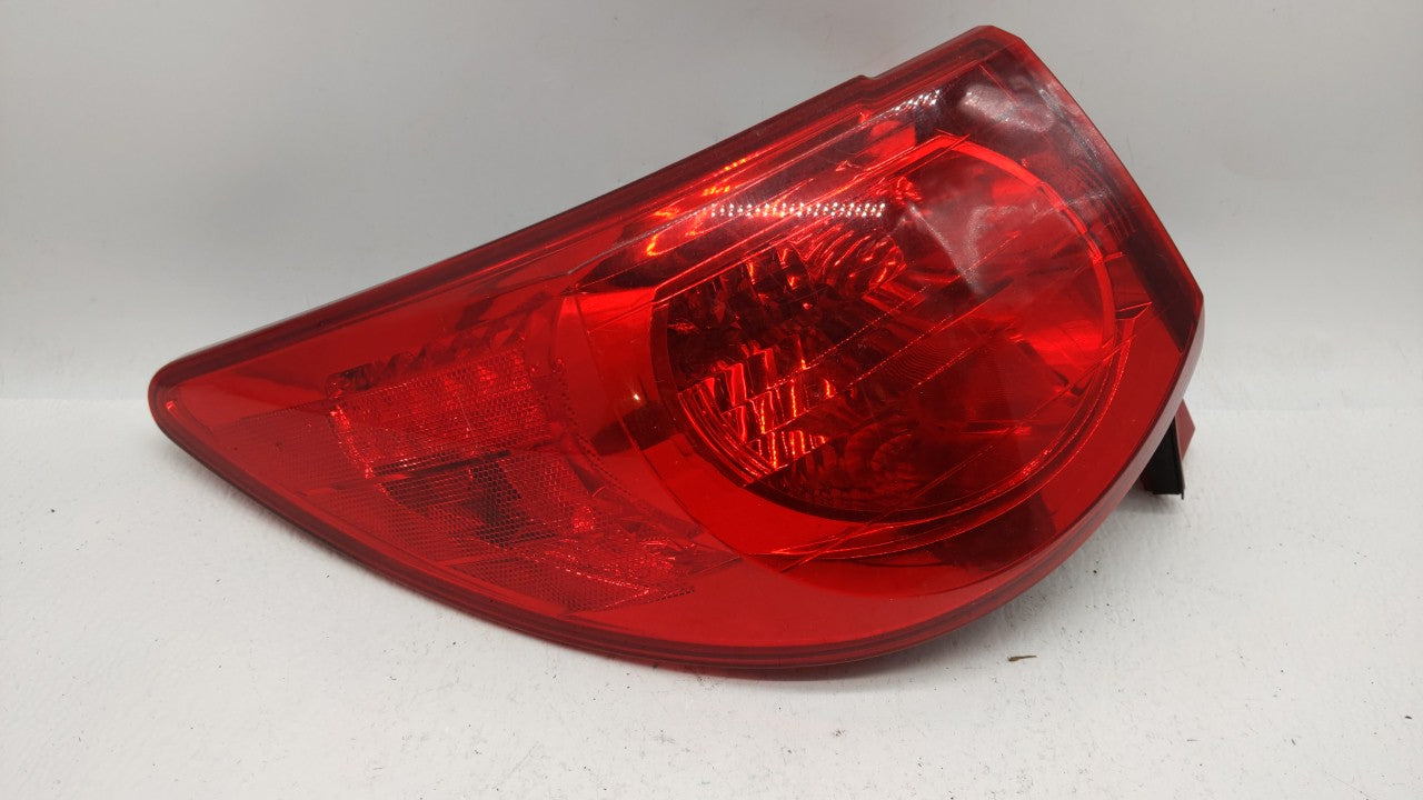 2003-2007 Saturn Ion Tail Light Assembly Driver Left OEM P/N:22723024 16530981 017 Fits 2003 2004 2005 2006 2007 OEM Used Auto Parts - Oemusedautoparts1.com