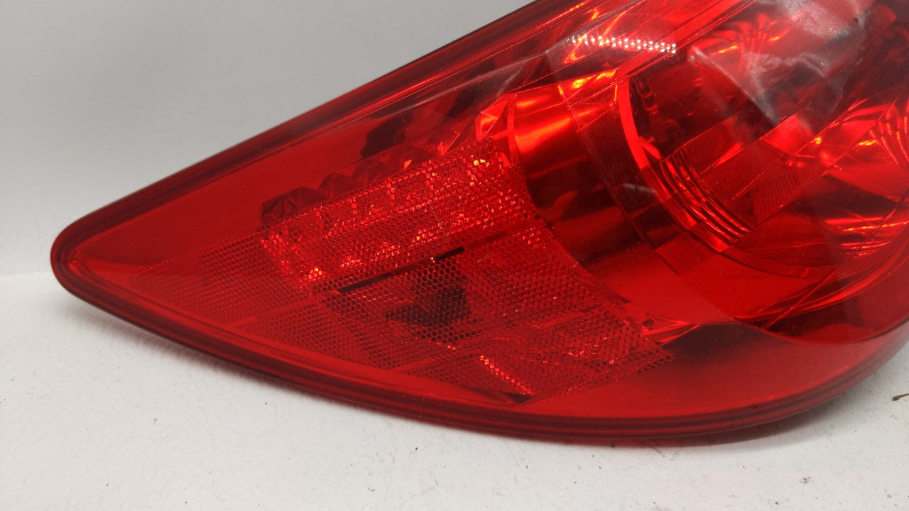 2003-2007 Saturn Ion Tail Light Assembly Driver Left OEM P/N:22723024 16530981 017 Fits 2003 2004 2005 2006 2007 OEM Used Auto Parts - Oemusedautoparts1.com