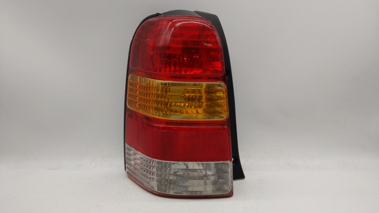 2001-2007 Ford Escape Tail Light Assembly Driver Left OEM P/N:4L84-13B505-D Fits 2001 2002 2003 2004 2005 2006 2007 OEM Used Auto Parts - Oemusedautoparts1.com