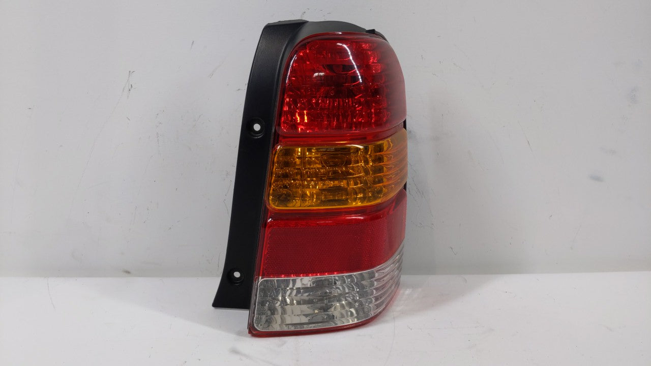 2001-2007 Ford Escape Tail Light Assembly Passenger Right OEM P/N:4L84-13B504-D Fits 2001 2002 2003 2004 2005 2006 2007 OEM Used Auto Parts - Oemusedautoparts1.com