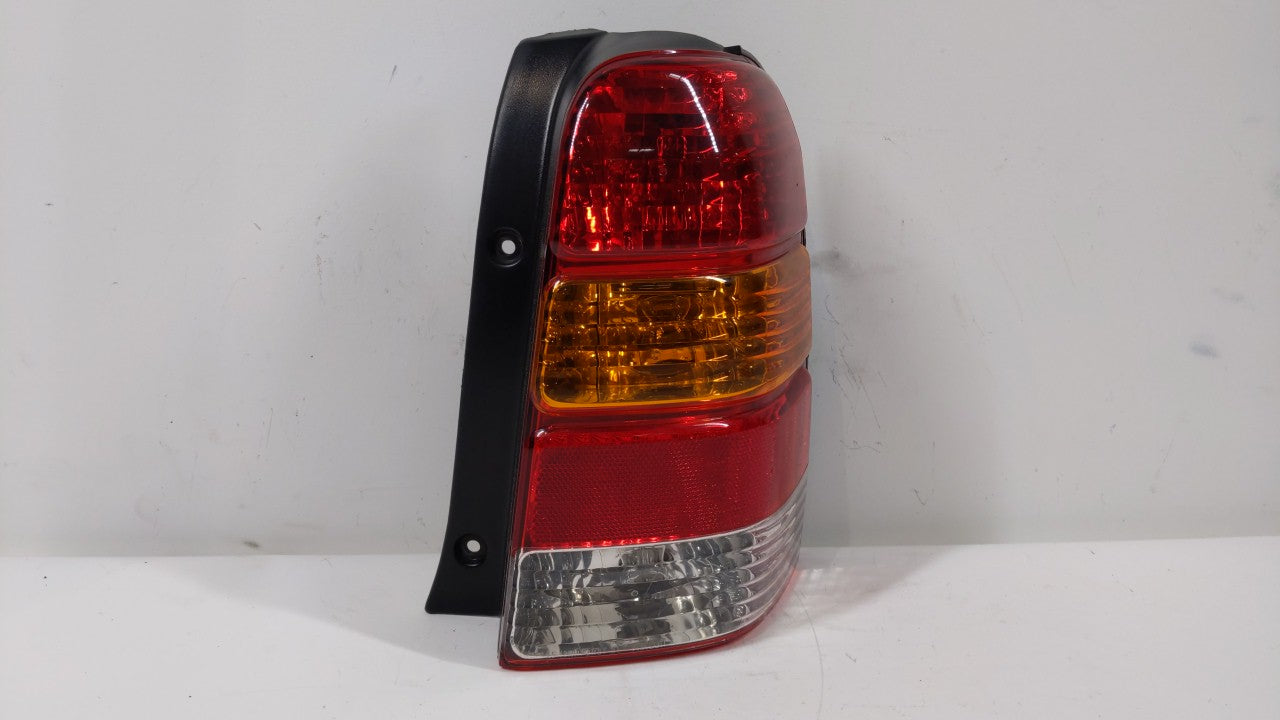 2001-2007 Ford Escape Tail Light Assembly Passenger Right OEM P/N:4L84-13B504-D Fits 2001 2002 2003 2004 2005 2006 2007 OEM Used Auto Parts - Oemusedautoparts1.com