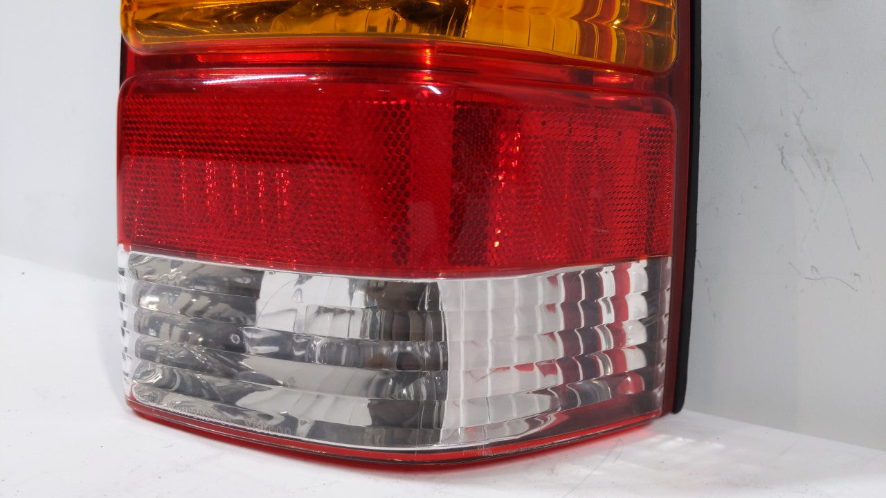 2001-2007 Ford Escape Tail Light Assembly Passenger Right OEM P/N:4L84-13B504-D Fits 2001 2002 2003 2004 2005 2006 2007 OEM Used Auto Parts - Oemusedautoparts1.com