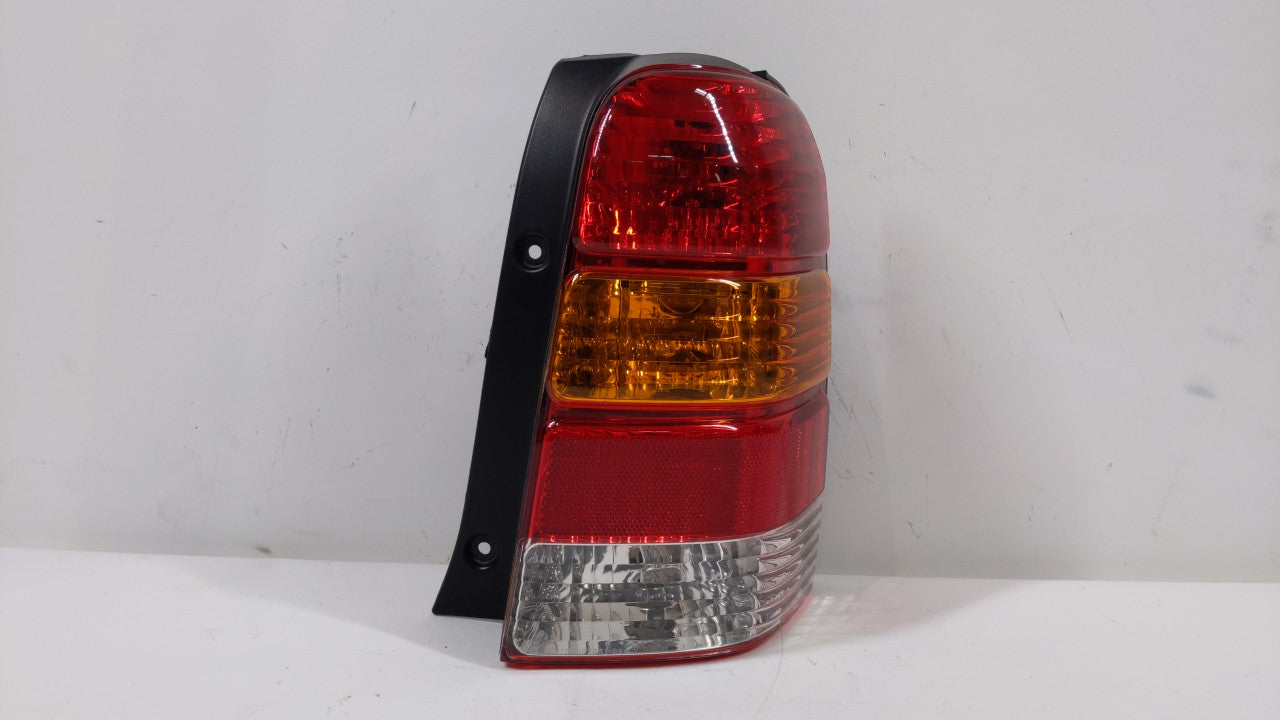 2001-2007 Ford Escape Tail Light Assembly Passenger Right OEM P/N:4L84-13B504-D Fits 2001 2002 2003 2004 2005 2006 2007 OEM Used Auto Parts - Oemusedautoparts1.com