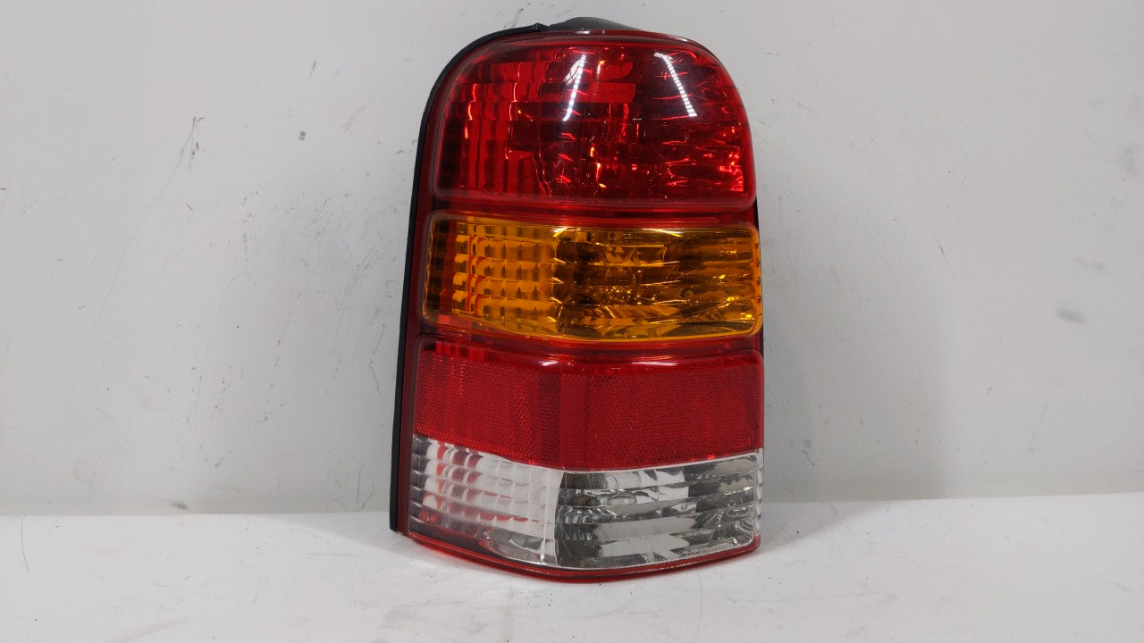 2001-2007 Ford Escape Tail Light Assembly Driver Left OEM P/N:4L84-13B505-D Fits 2001 2002 2003 2004 2005 2006 2007 OEM Used Auto Parts - Oemusedautoparts1.com