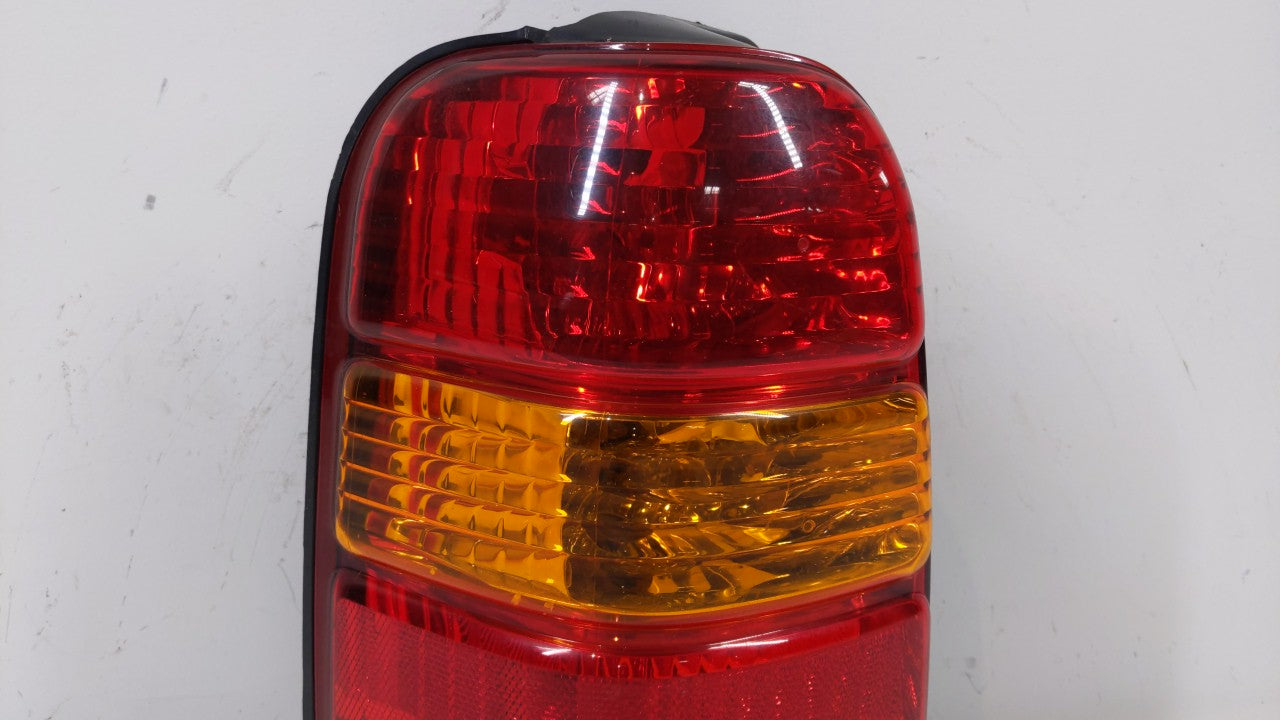 2001-2007 Ford Escape Tail Light Assembly Driver Left OEM P/N:4L84-13B505-D Fits 2001 2002 2003 2004 2005 2006 2007 OEM Used Auto Parts - Oemusedautoparts1.com