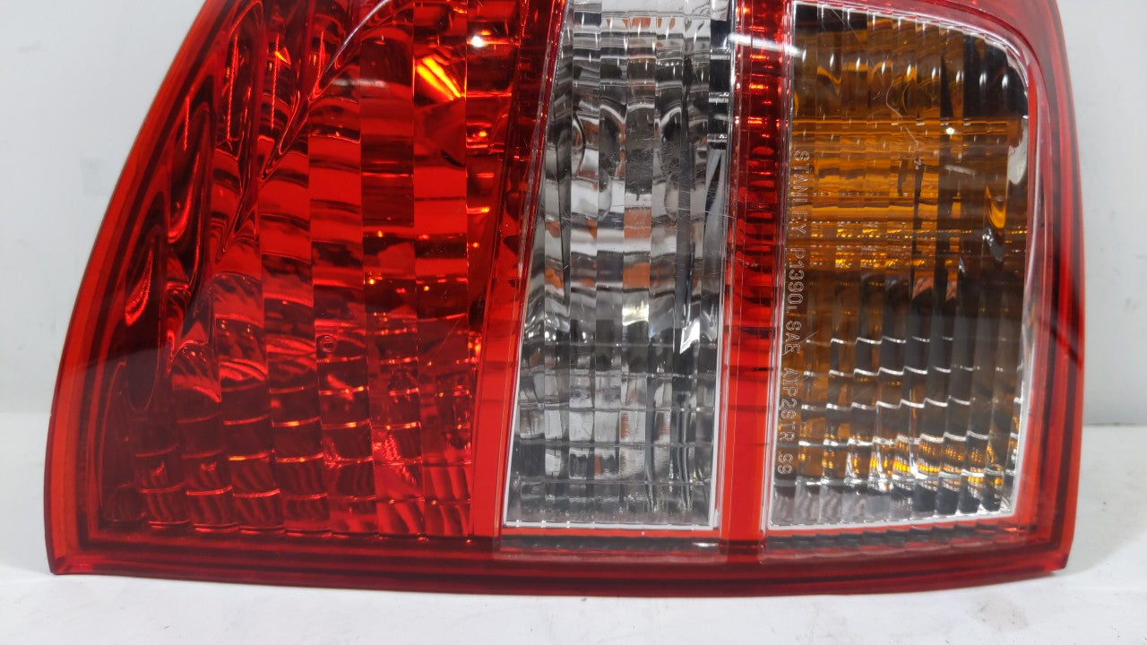 2002-2004 Isuzu Axiom Tail Light Assembly Driver Left OEM Fits 2002 2003 2004 OEM Used Auto Parts - Oemusedautoparts1.com