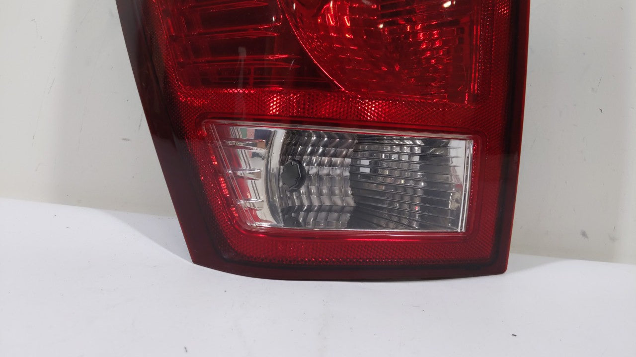 2007-2010 Jeep Grand Cherokee Tail Light Assembly Driver Left OEM P/N:55079013AA 55079013AC Fits 2007 2008 2009 2010 OEM Used Auto Parts - Oemusedautoparts1.com