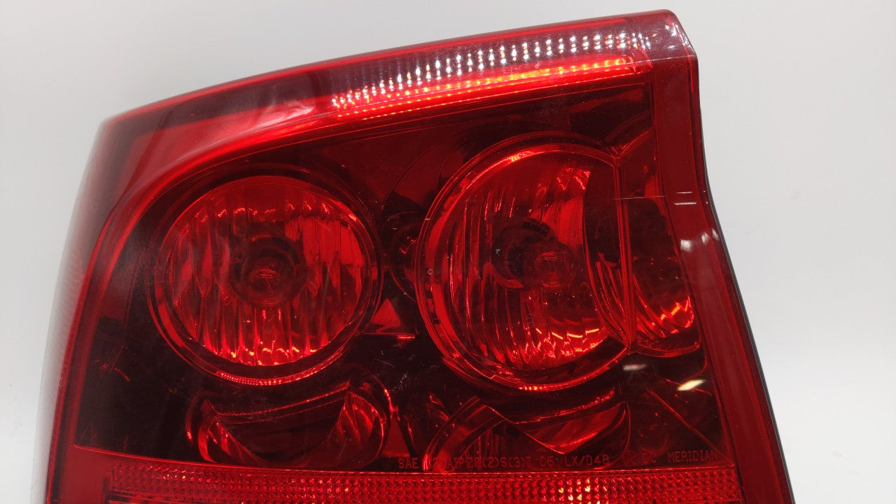 2006-2008 Dodge Charger Tail Light Assembly Driver Left OEM P/N:04805849AD 04805849AB Fits 2006 2007 2008 OEM Used Auto Parts - Oemusedautoparts1.com