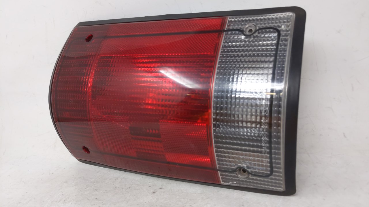 2002-2004 Ford E-150 Tail Light Assembly Driver Left OEM P/N:F7UB-13441-AA Fits 2000 2001 2002 2003 2004 2005 OEM Used Auto Parts - Oemusedautoparts1.com