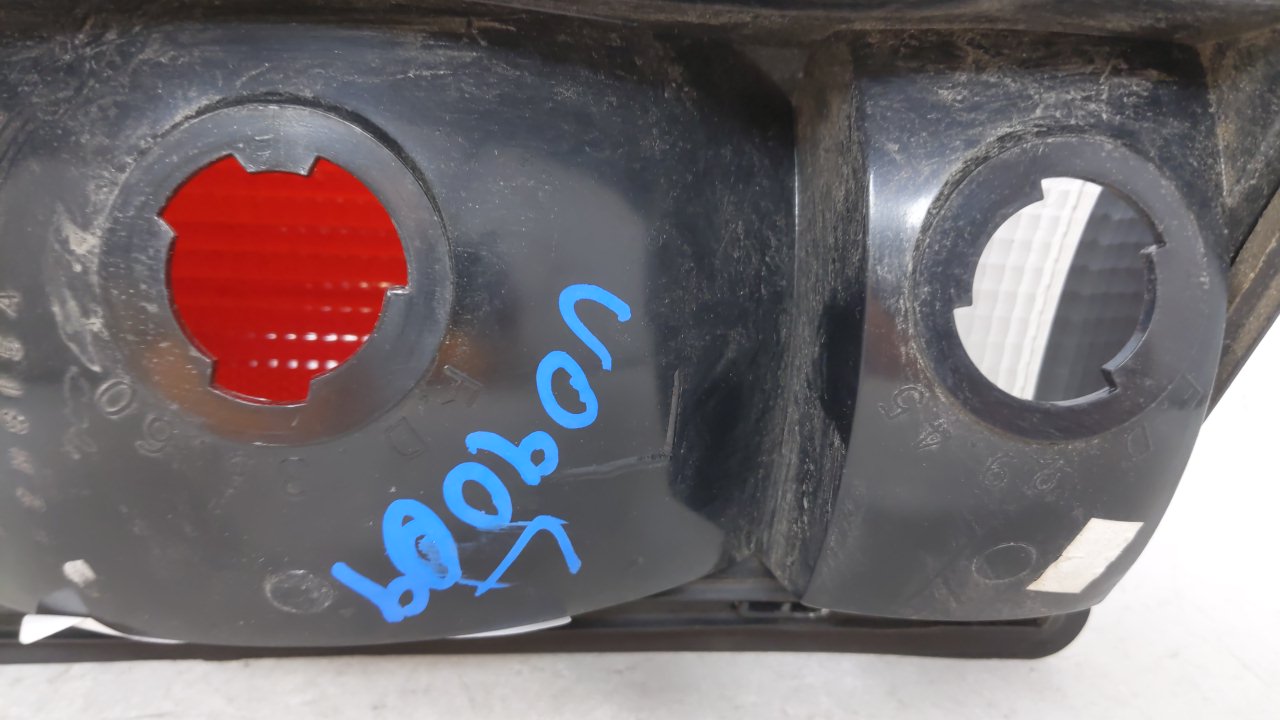 2002-2004 Ford E-150 Tail Light Assembly Driver Left OEM P/N:F7UB-13441-AA Fits 2000 2001 2002 2003 2004 2005 OEM Used Auto Parts - Oemusedautoparts1.com