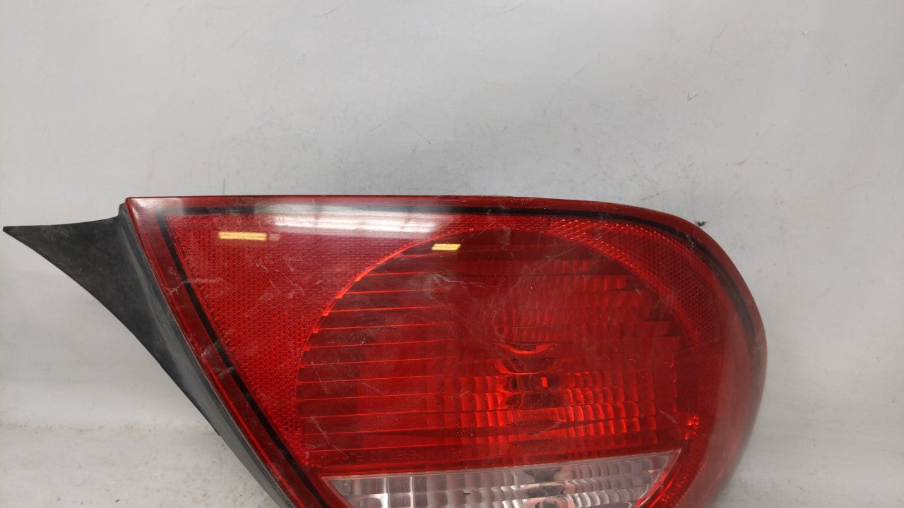 2003-2005 Dodge Neon Tail Light Assembly Driver Left OEM Fits 2003 2004 2005 OEM Used Auto Parts - Oemusedautoparts1.com