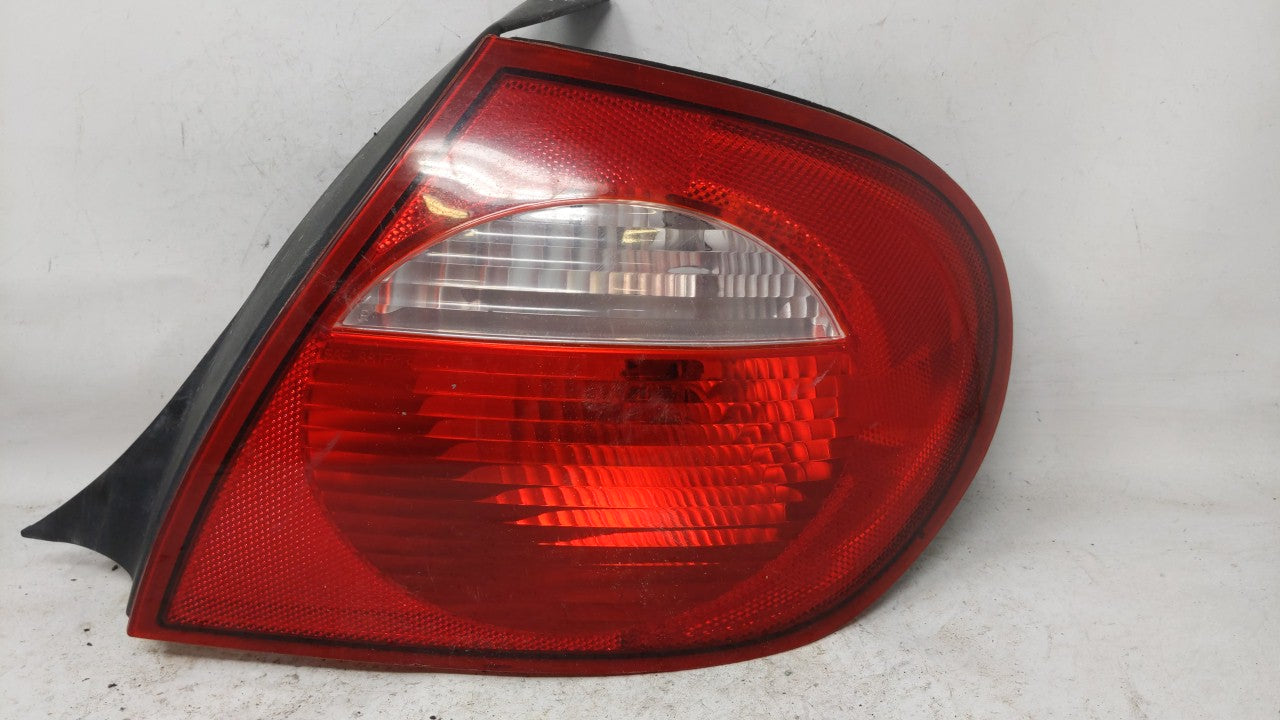 2003-2005 Dodge Neon Tail Light Assembly Driver Left OEM Fits 2003 2004 2005 OEM Used Auto Parts - Oemusedautoparts1.com