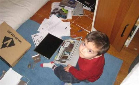 kid destroying laptop