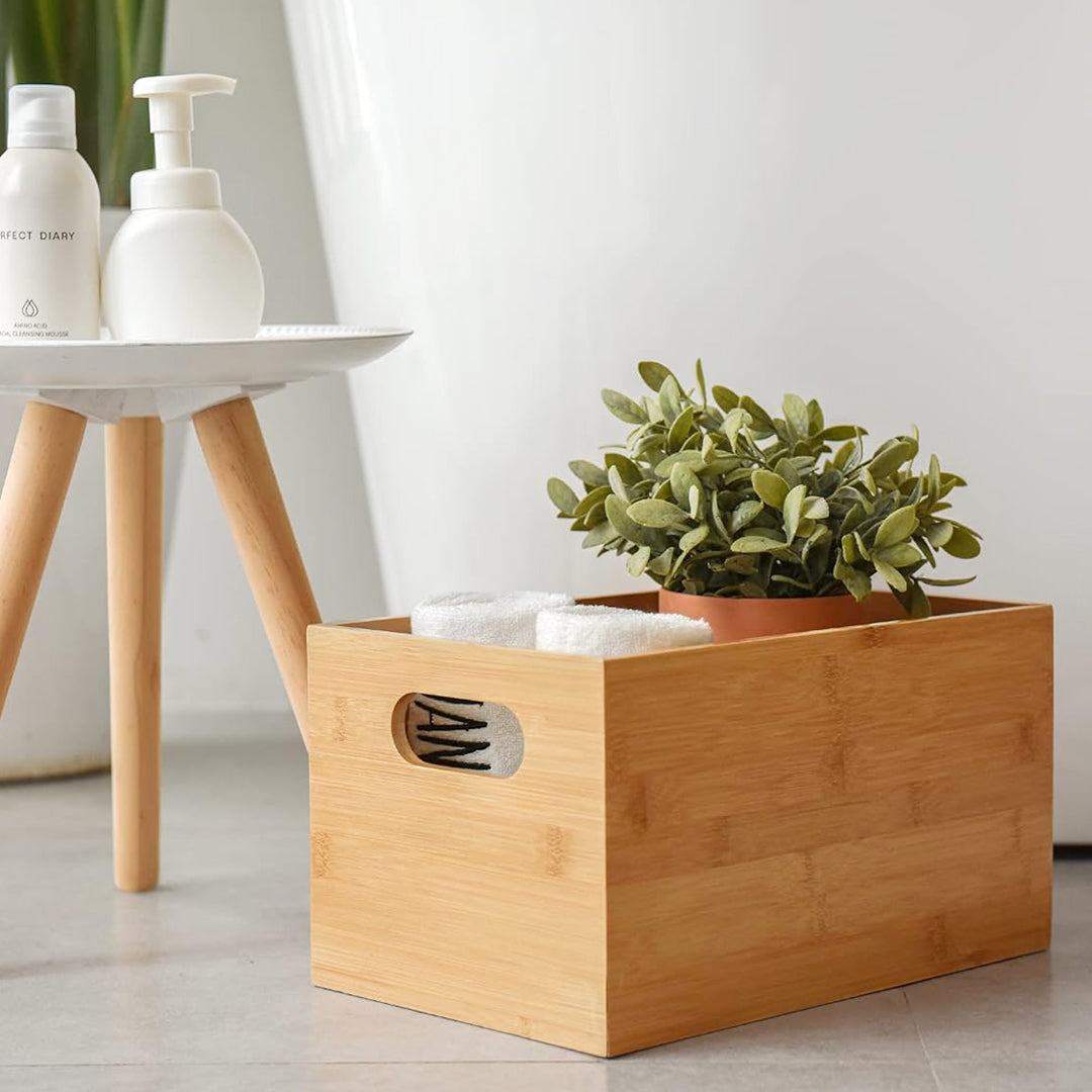 Use bamboo storage container store towels, shampoo, houseplant beside the bathtub in the bathroom