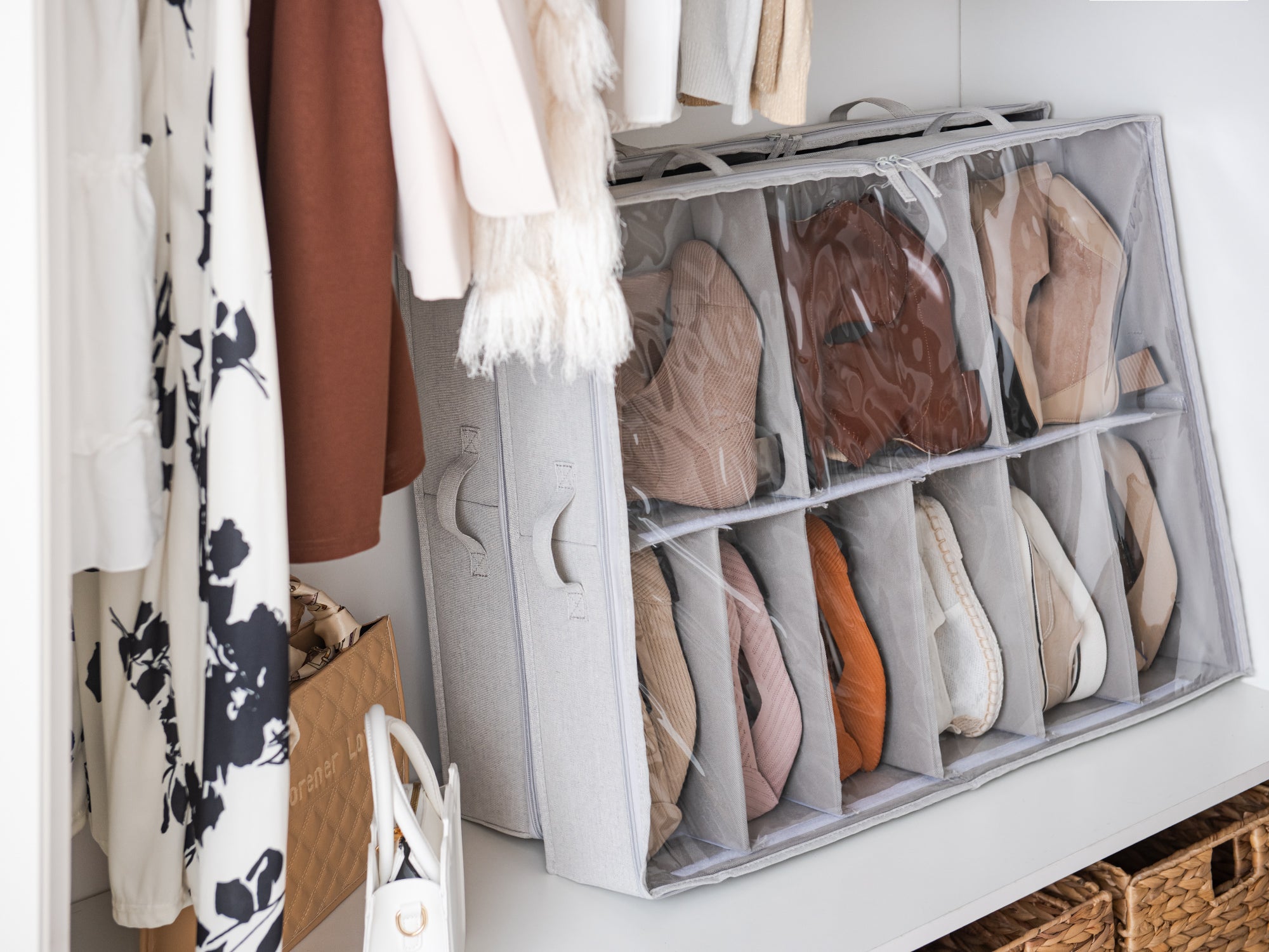 Two gray shoe storage organizer stored inside a closet in a bedroom