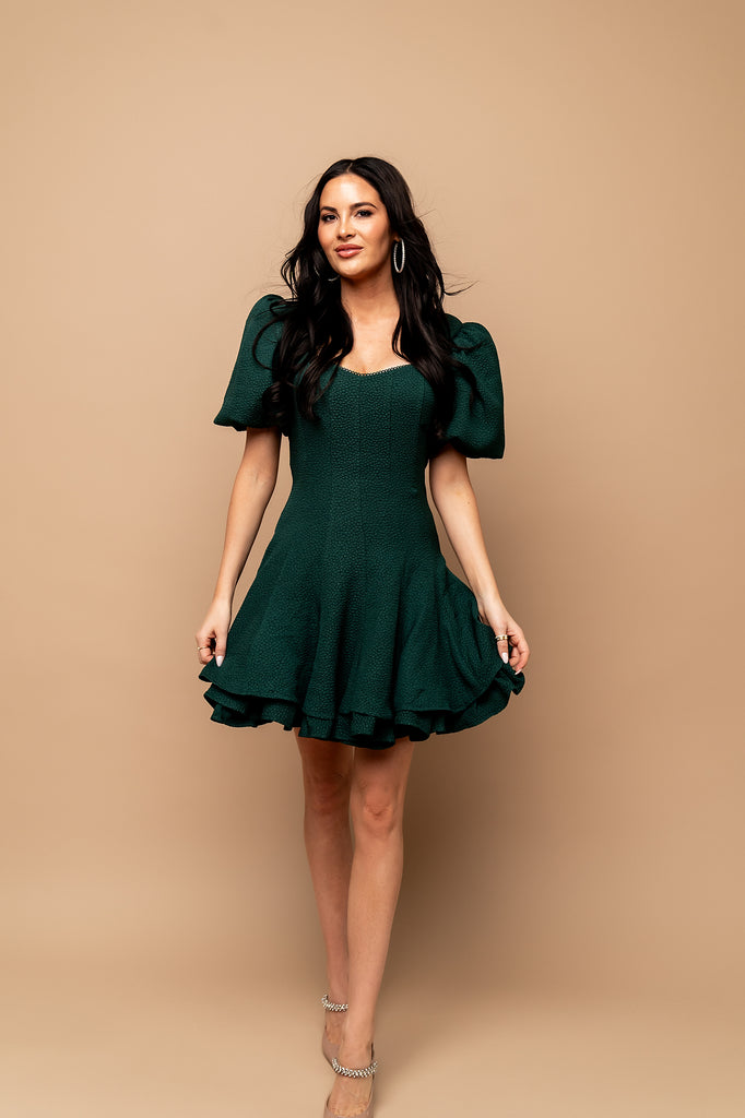 Rachel Parcell in photo studio wearing Dark Emerald V-neck Flared Dress