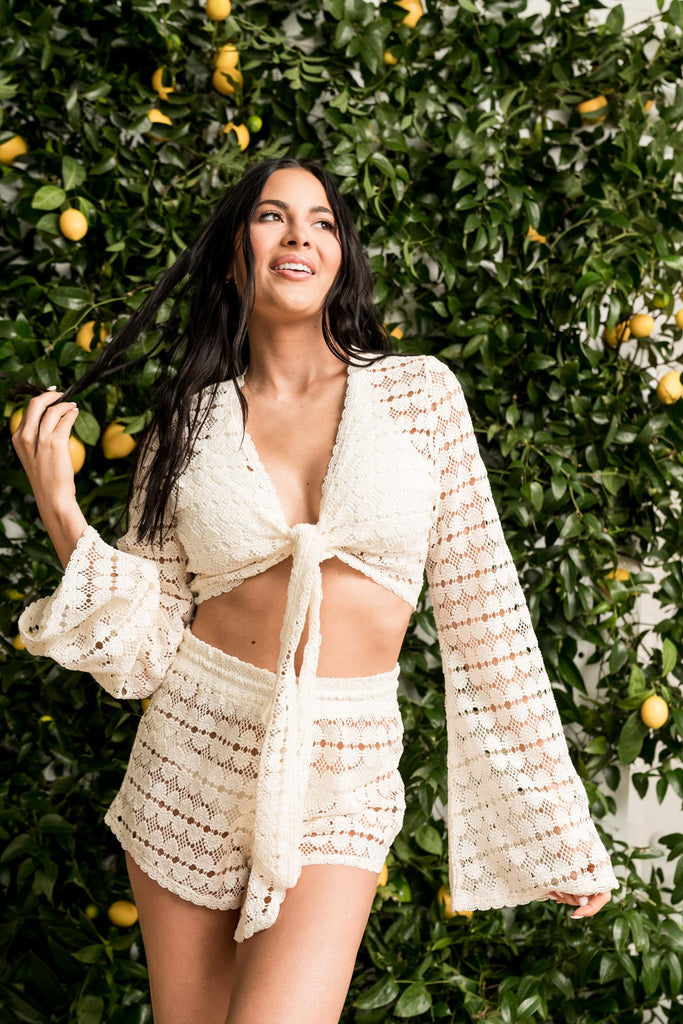 Rachel Parcell wearing two-piece Beach Riot crochet cover up set 