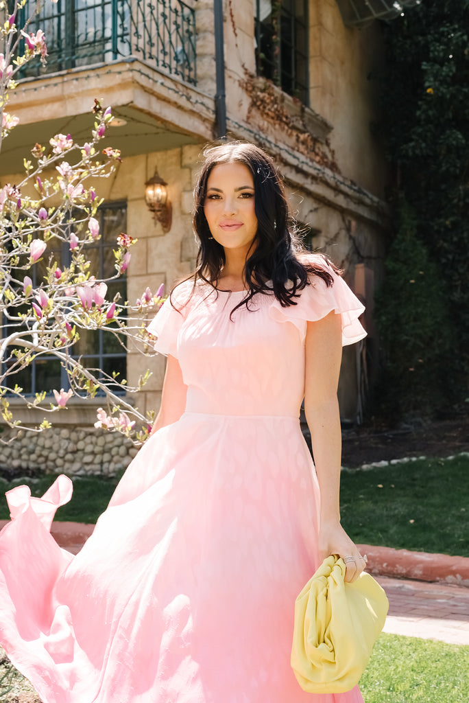 Rachel Parcell wearing RP Blush Ruffle Sleeve Ombre Midi Dress