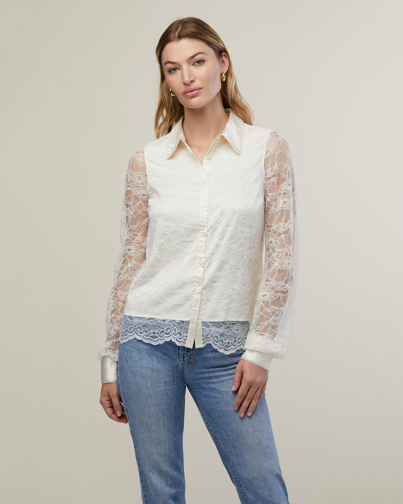 Close up image of model in photo studio wearing jeans and Ivory Lace Button Up Shirt