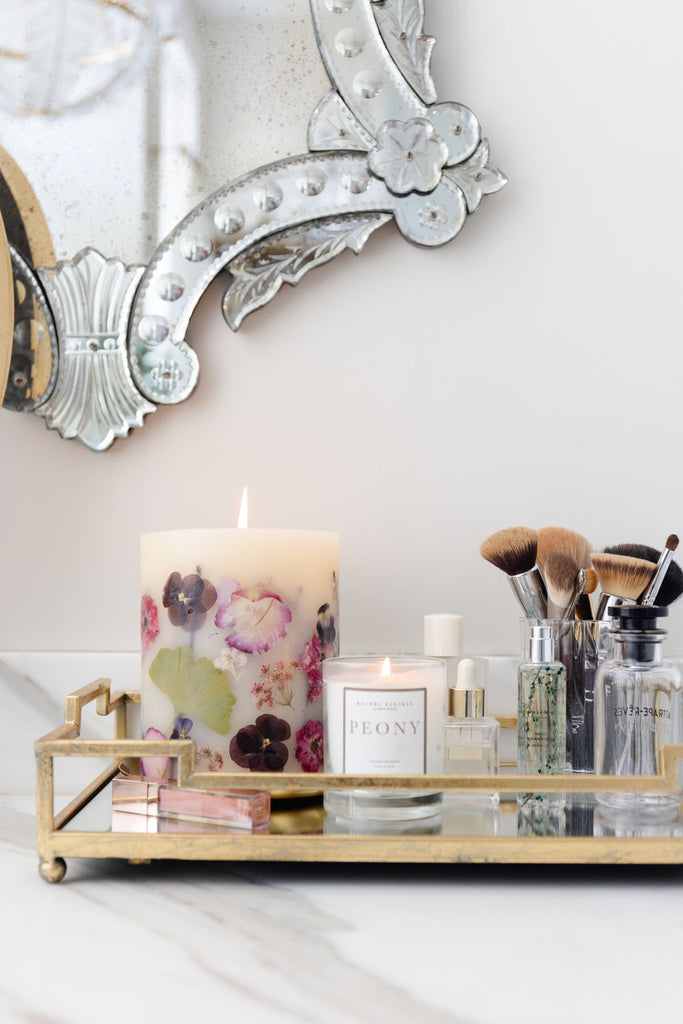 Rosy Rings candles on Rachel Parcell's bathroom vanity
