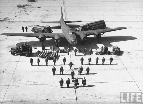 Crewmen posing with a B-17E Flying Fortress in Tampa, Florida, 1942. Photo from the LIFE Magazine archives.