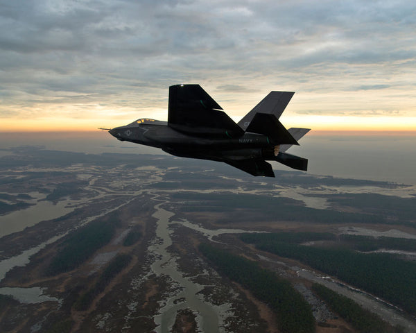 The F-35C test aircraft CF-2 flies over Naval Air Station Patuxent River, MD on January 28, 2013.