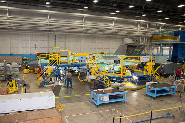 Teams at the Lockheed Martin facility in Fort Worth, Texas work on the second F-35A for the Royal Netherlands Air Force in December 2012.