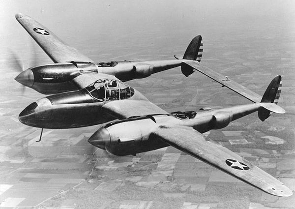  The Lockheed P-38 Lightning was a World War II American fighter aircraft built by Lockheed; it had distinctive twin booms and a single, central nacelle containing the cockpit and armament. The P-38 was the only American fighter aircraft in production throughout American involvement in the war. 