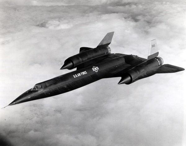 SR-71 flying through the clouds black and white 