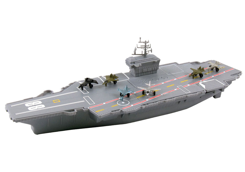 toy aircraft carrier with planes