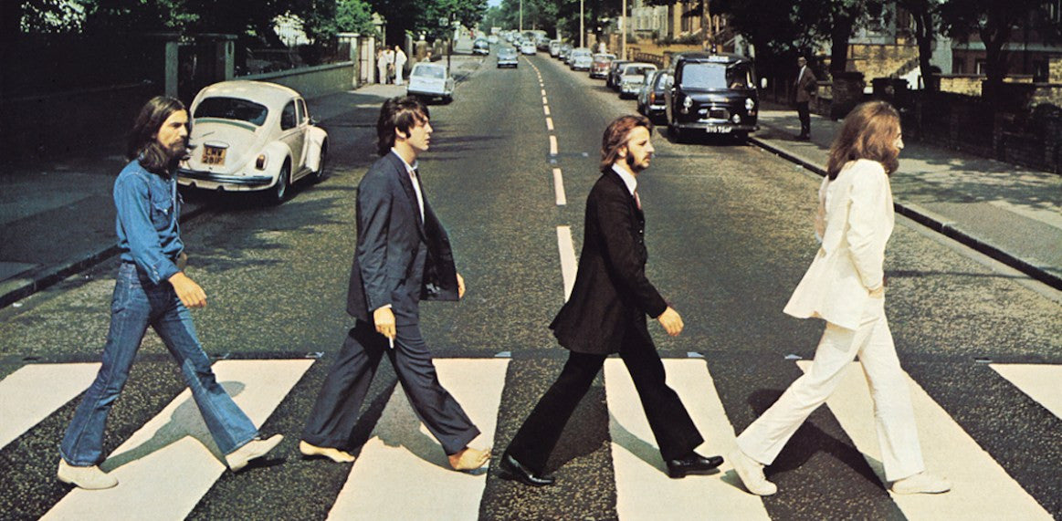 The Beatles cross Abbey Road