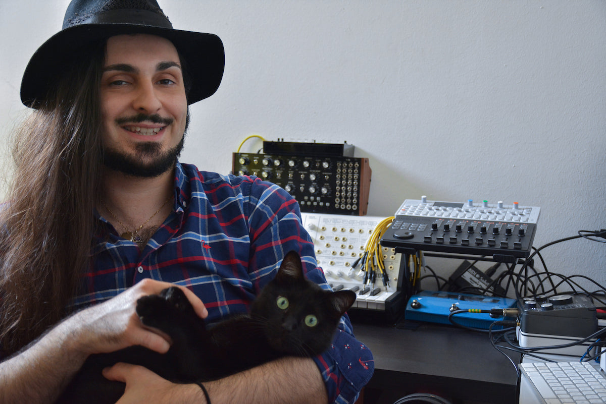 Yoann Laulan and his feline friend. Picture credit: Aurore Athomas