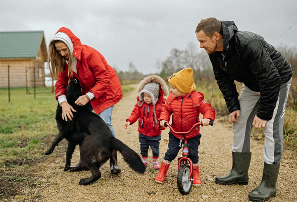 family and black dog pet memorial