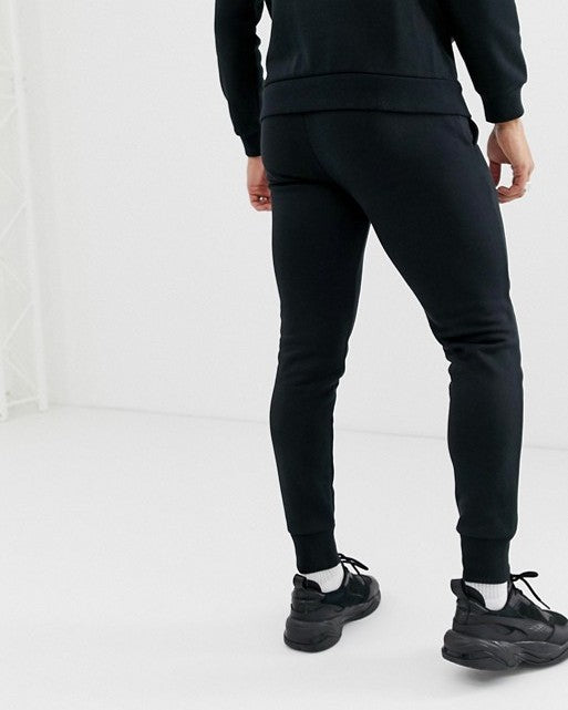 puma essential skinny joggers in black