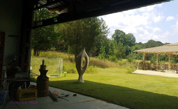 Looking out of the hanger over the gazebo at the pond. 