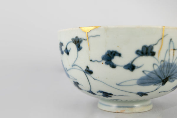 Kintsugi bowl with cracks, tablware, ceramics. Japanese technique