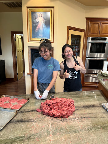 Ali and Claire prepare hamburgers with ground beef from Family Friendly Farms in Grass Valley, CA