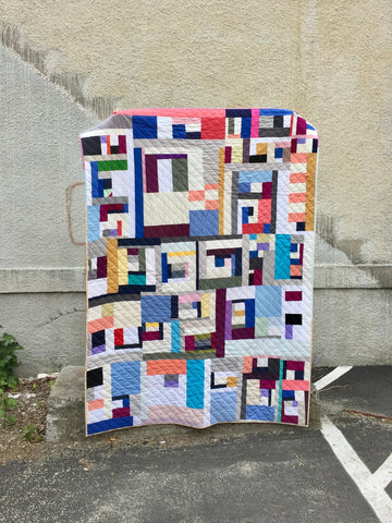 solid improv throw quilt by salty oat