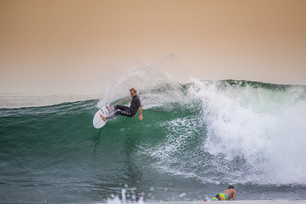 Josh Kerr surfing with Pro-Lite surf traction