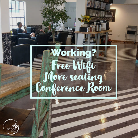 interior view of cafe with tables and man sipping coffee in background with the words, "Working? Free Wifi, more seating, conference room"