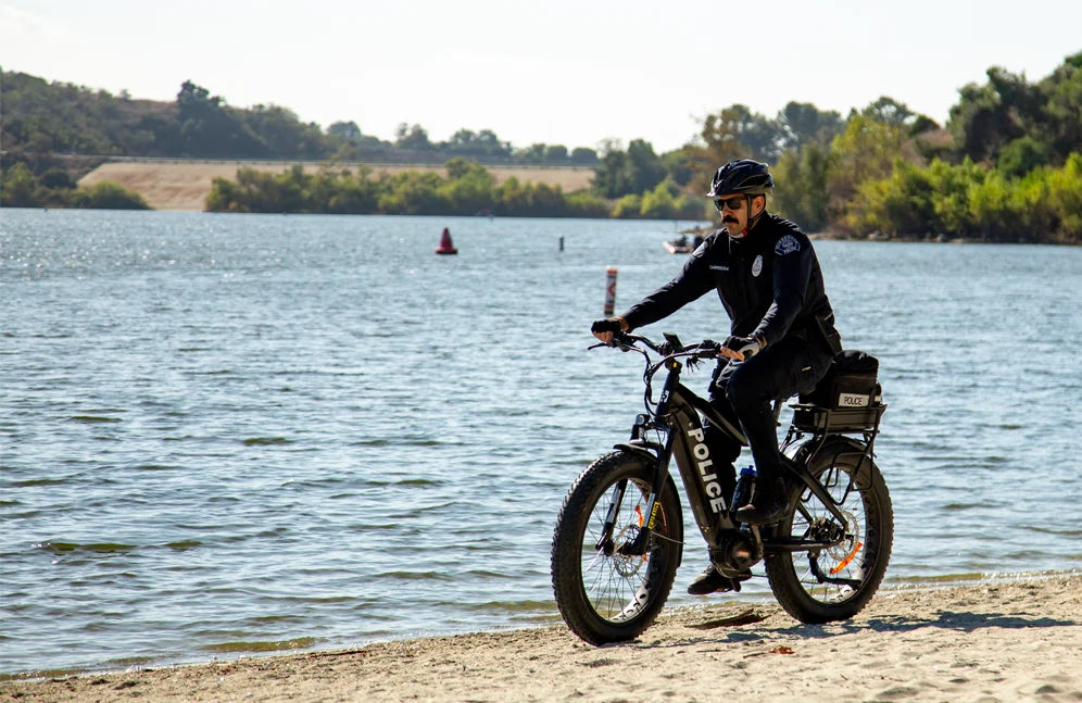 Police Officer Riding Along a Lake on the ATR 528 Police eBike