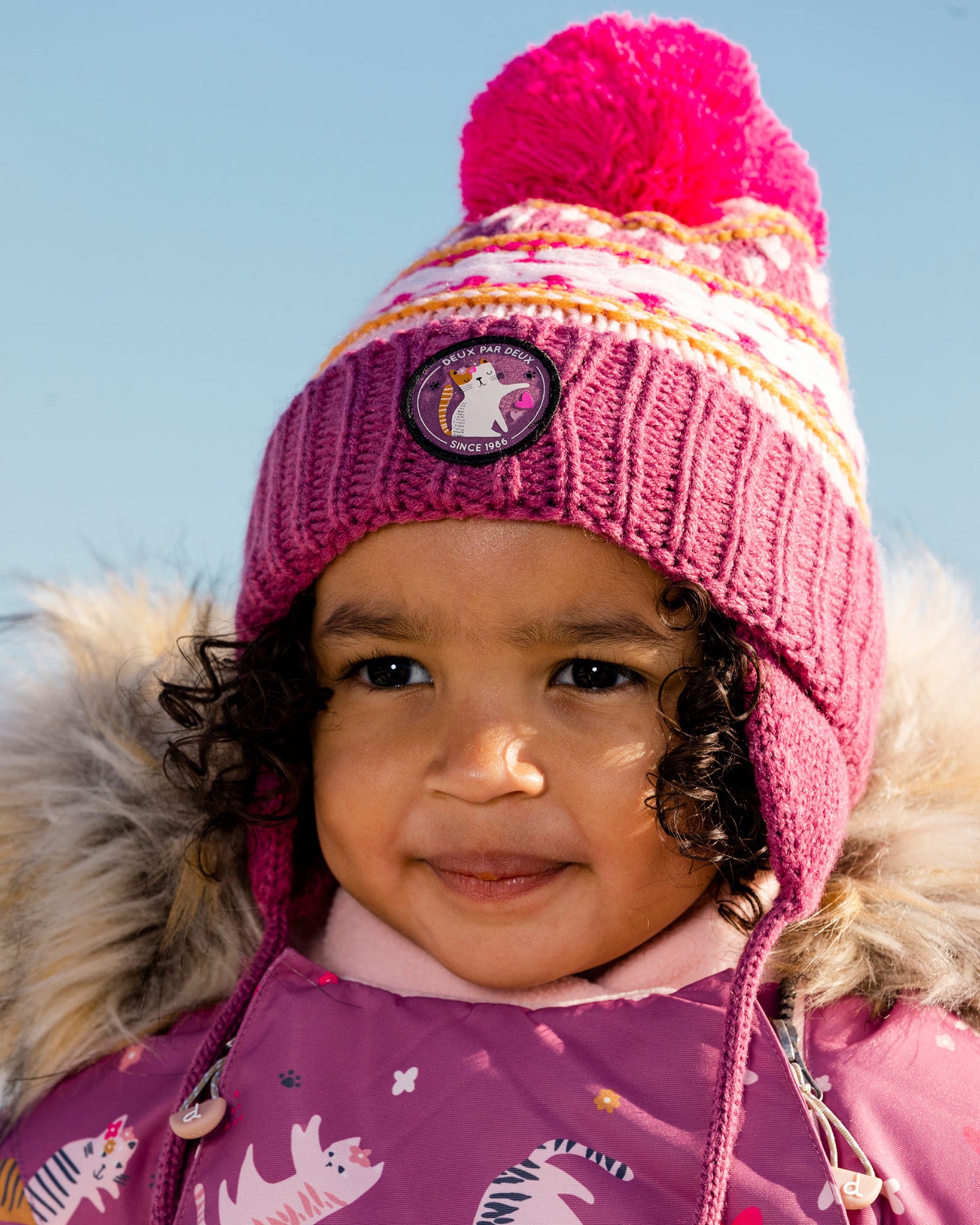 Deux par Deux Tuque d'hiver à pompon avec cache-oreille mauve et rose -  Bébé Fille