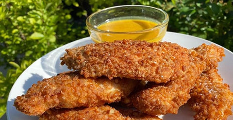 Pretzel Crusted Chicken Breast Tenders with honey mustard dipping sauce